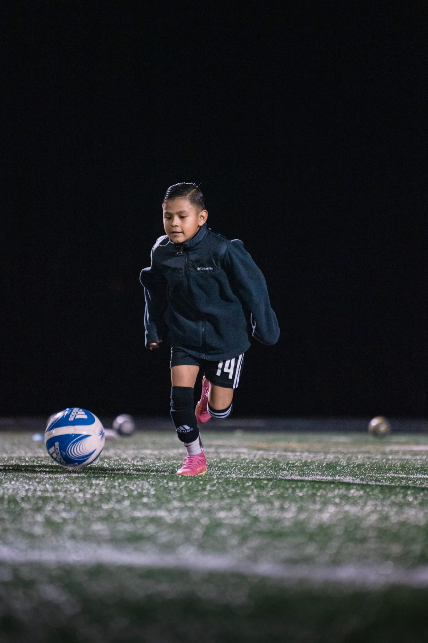 Young player showing soccer skills at Genesis Futbol Club, a Portland youth soccer club