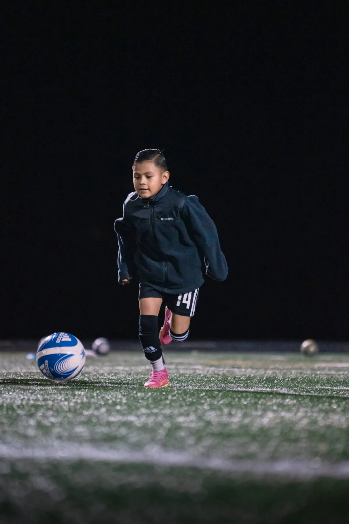 Young player showing soccer skills at Genesis Futbol Club, a Portland youth soccer club